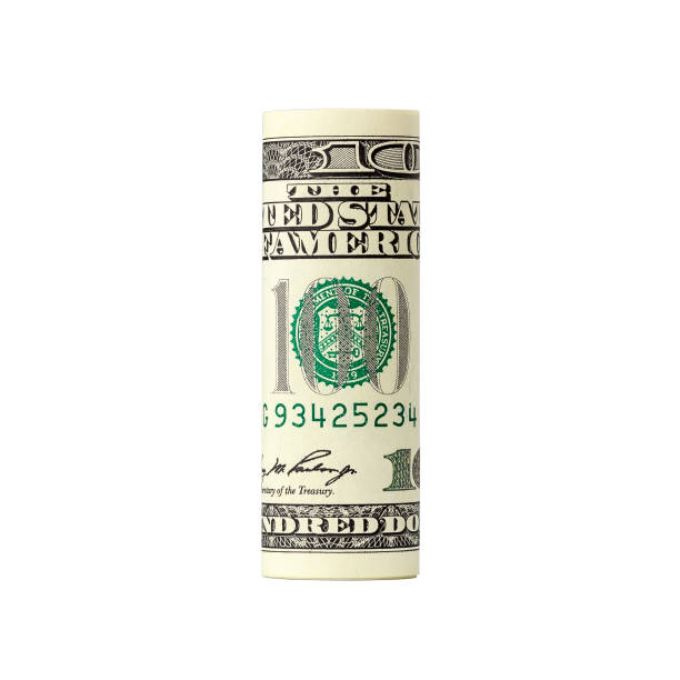 Rolled up hundred dollar bill isolated on white background. Hundred dollar bills rolled up. Folded dollars