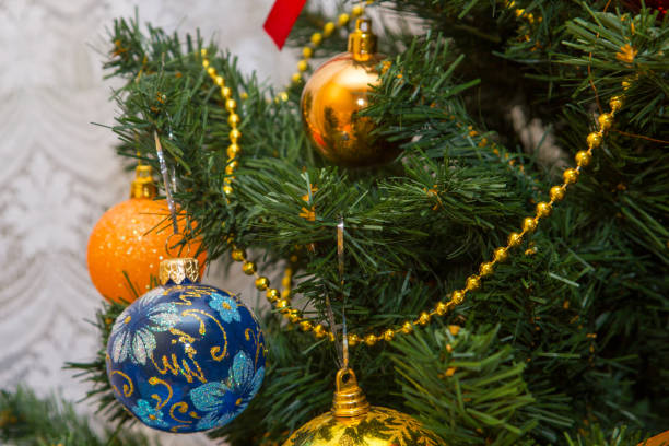 istock Christmas tree decorated with baubles and ribbon 1194709153