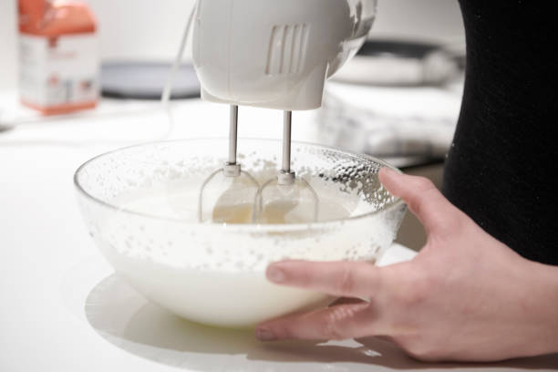 istock House wife whipping cream 1194709853