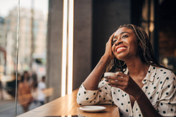 istock Woman drinking coffee at the cafe 1194711405