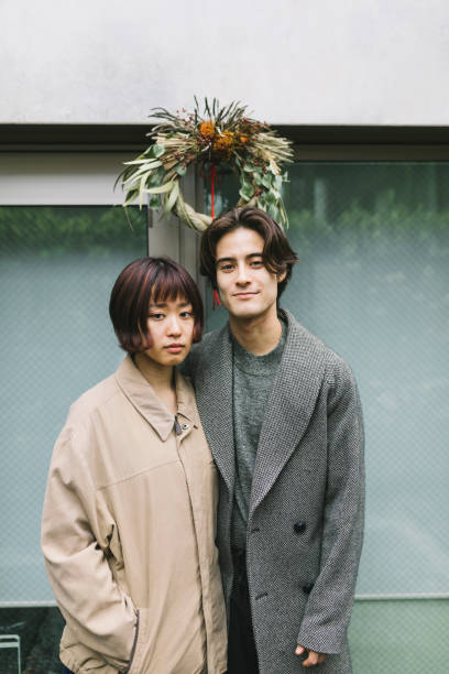 istock Couple standing under Shimekazari 1194714187