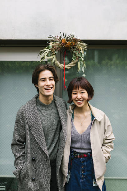 istock Couple standing under Shimekazari 1194714757