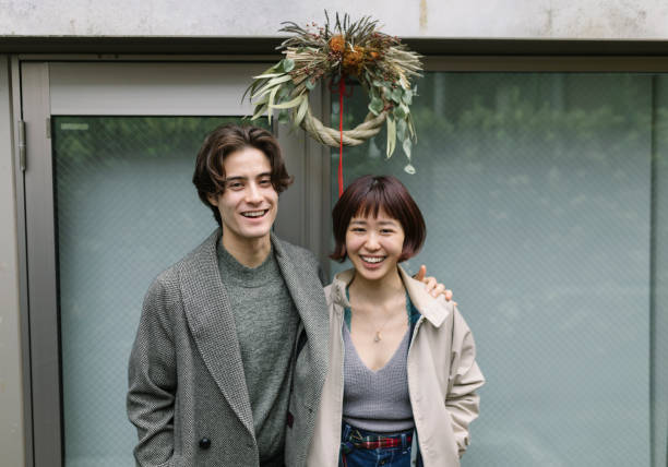 istock Couple standing under Shimekazari 1194714790
