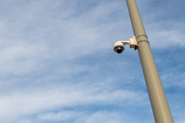 istock surveillance camera on a pole in the street 1194716651