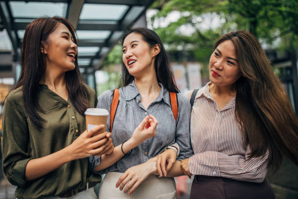 istock Three young women  in the city 1194718286