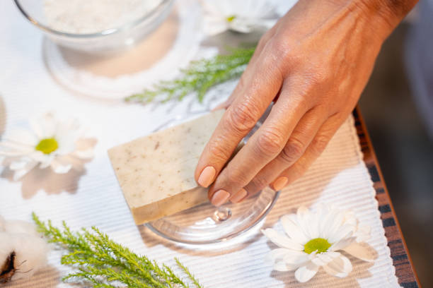 istock Female hand taking a cosmetic soap from the table 1194722006