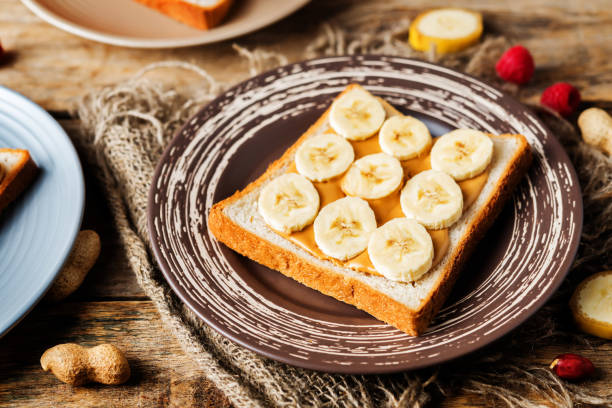 istock Peanut butter sandwich with fruits 1194724031