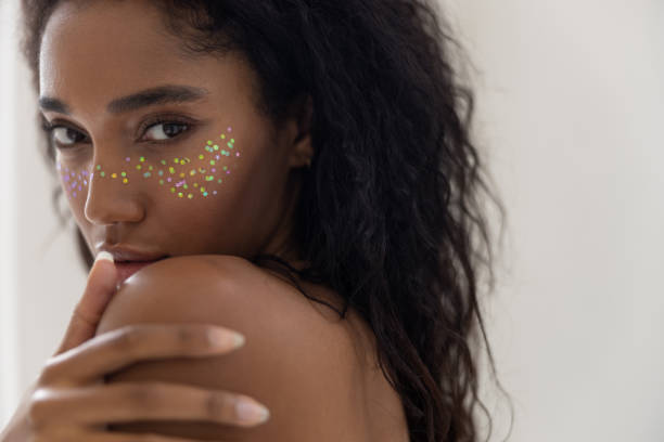 istock Shy woman with startling makeup posing for camera 1194724120