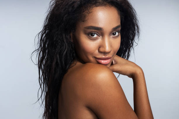 istock Young Afro-American woman is posing in studio 1194724856