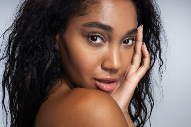 istock Beautiful Afro-American woman is posing in studio 1194724865
