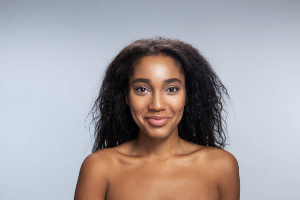 istock Beautiful Afro-American woman is smiling in studio 1194724880