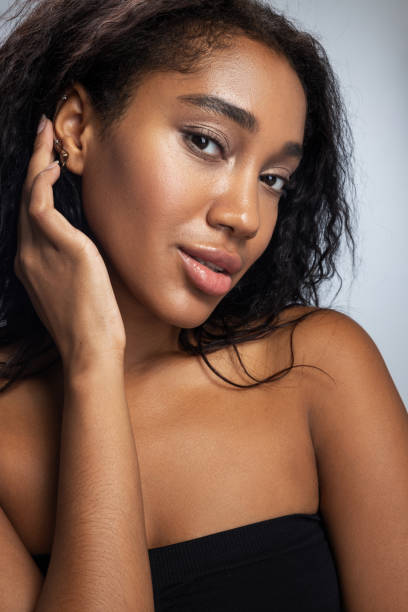 istock Beautiful young lady is smiling in studio 1194724893