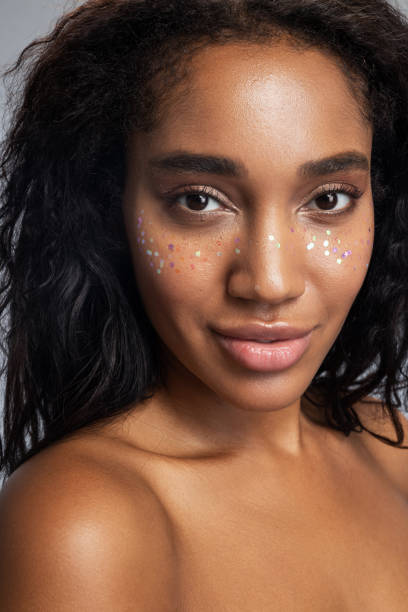 istock Beautiful woman with startling makeup posing for camera 1194724928