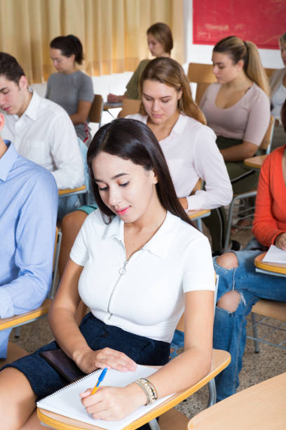 istock Girl during classes in auditorium 1194727984