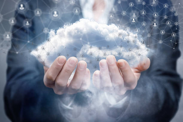 istock A businesswoman holding a cloud with network connections. 1194730737