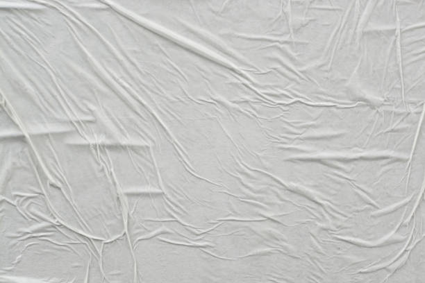 istock White creased poster texture. Abstract background. 1194732366