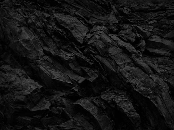 Black rock background. Dark gray stone texture. Black grunge background. Mountain close-up. Distressed backdrop. Black rock grunge texture background for your design. Distressed background. basalt photos stock pictures, royalty-free photos & images