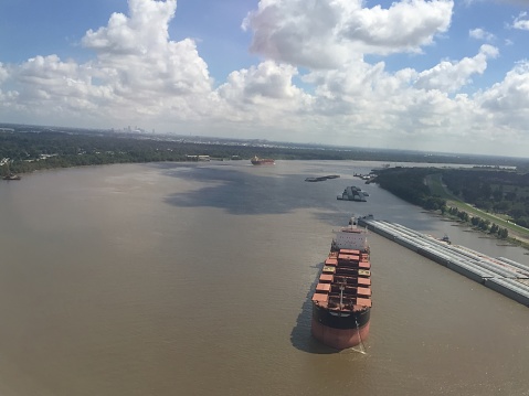 flying over Mississippi River cargo ships in Louisiana