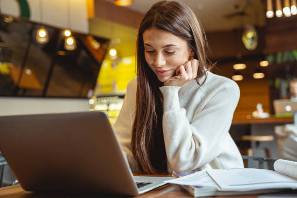 istock Positive delighted long haired girl working with pleasure 1194736278