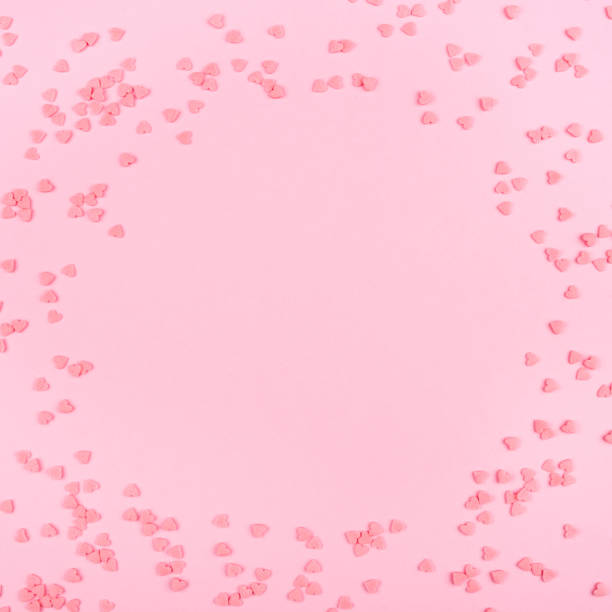 istock Pink background with tiny hearts. Valentine's day concept. 1194737493