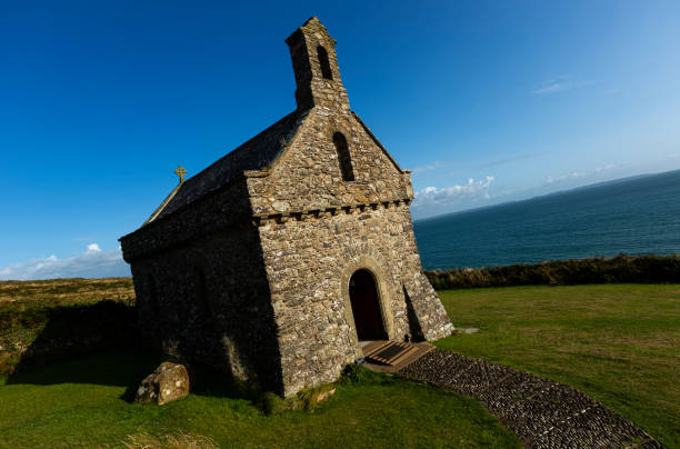 istock St Non's Chapel (by the coast near St David's), Pembrokeshire, Wales, UK 1194738503