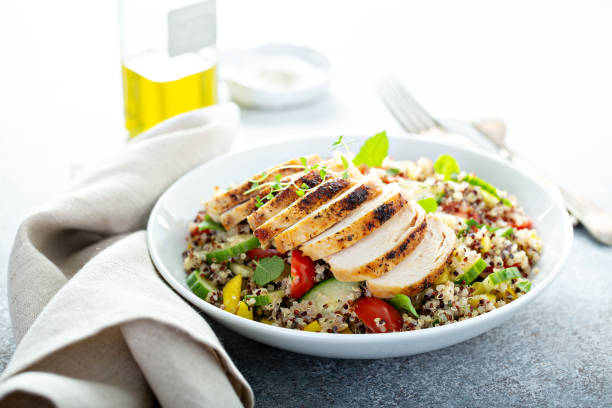 istock Fresh quinoa tabbouleh salad with grilled chicken 1194739827