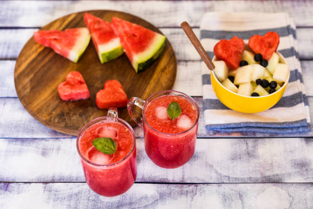 istock Fruit salad made from melon, watermelon and chokeberry with watermelon juice on table 1194739944