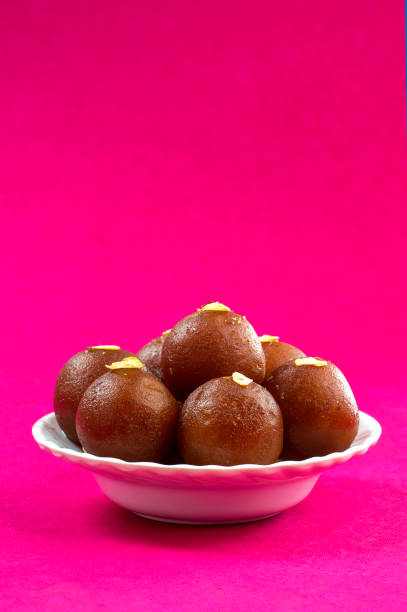 istock Indian Dessert : Gulab Jamun in white bowl 1194742672