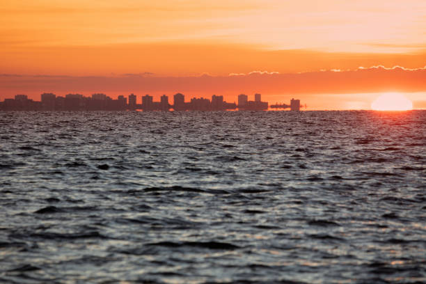 View from Sanibel Island at sunrise. \nSanibel, Florida, USA.