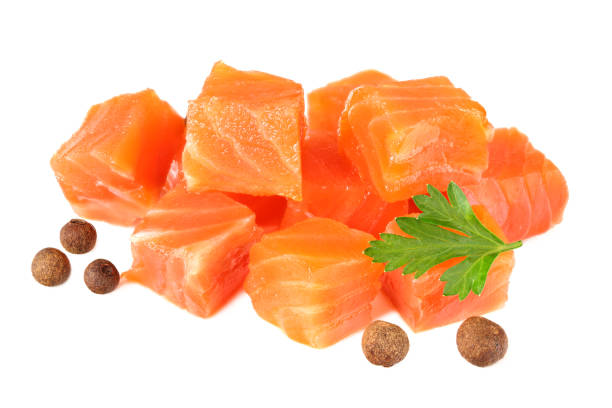 istock Red fish. Raw salmon fillet with parsley and peppercorns isolate on white background 1194745084