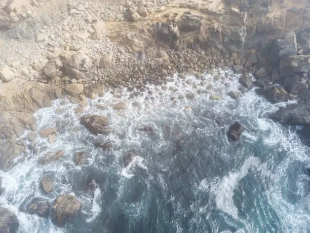 Photo of Aerial View of Rugged Coastline and Ocean in California