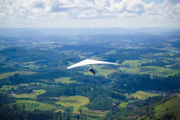 Hang glider flying in the brazilian mountains.