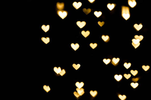 istock Golden heart bokeh background 1194750214