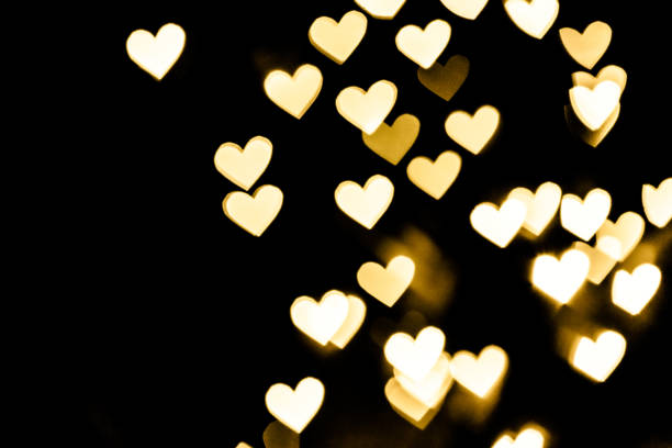 Golden heart bokeh background