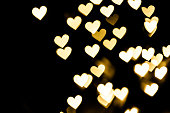Golden heart bokeh background