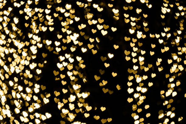 istock Golden heart bokeh background 1194750228