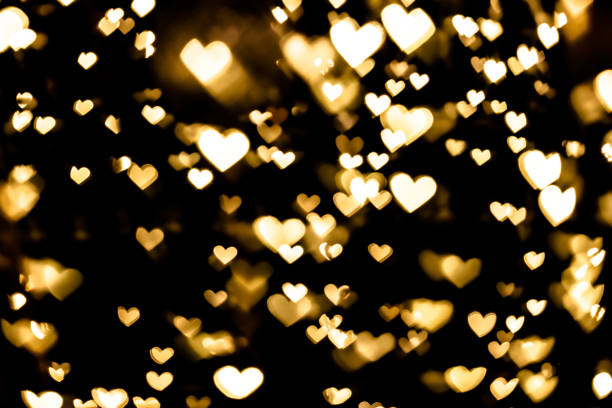 istock Golden heart bokeh background 1194750237