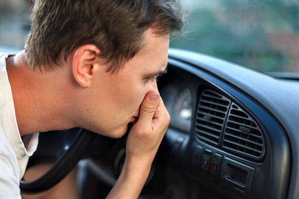 istock bad smell and car 1194753817