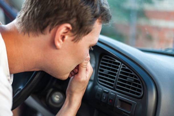 istock bad smell and car 1194753835