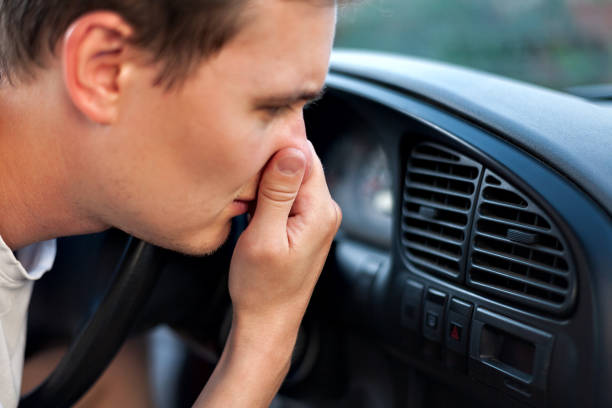 istock bad smell and car 1194753848