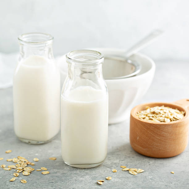 istock Oat milk in glass bottles 1194753865
