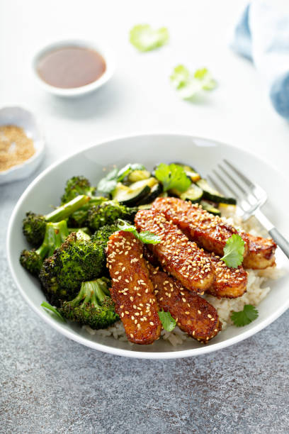 istock Teryaki tempeh with rice and vegetables 1194753867