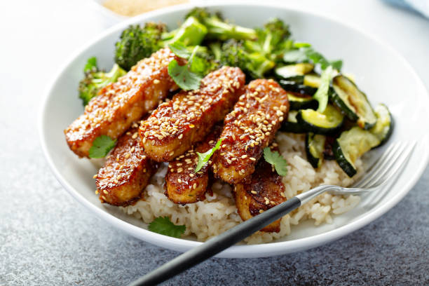 istock Teryaki tempeh with rice and vegetables 1194753871