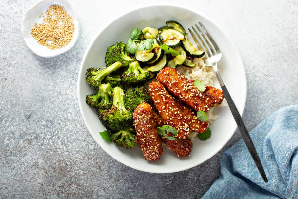 istock Teryaki tempeh with rice and vegetables 1194753872