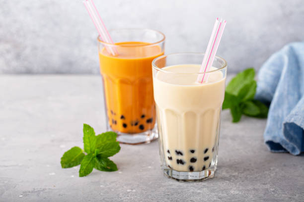 Boba bubble tea with straws Boba bubble tea in tall glasses with straws bubble tea photos stock pictures, royalty-free photos & images