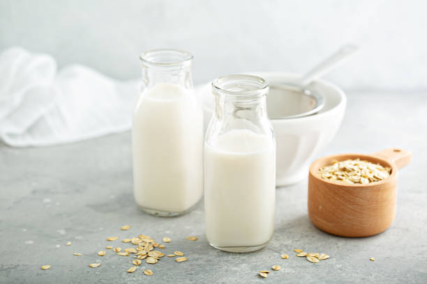 istock Oat milk in glass bottles 1194753979