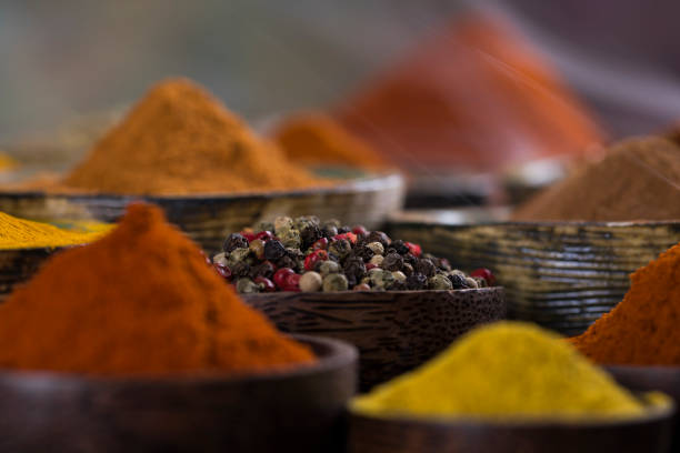 istock Colorful spices in bowl background 1194755923