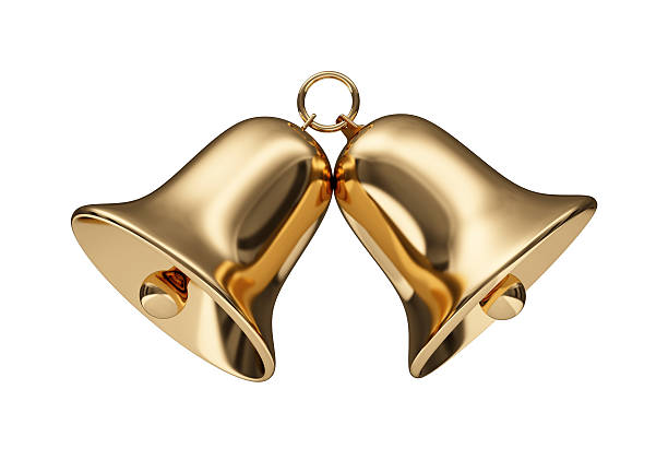 Close-up of two small golden bells