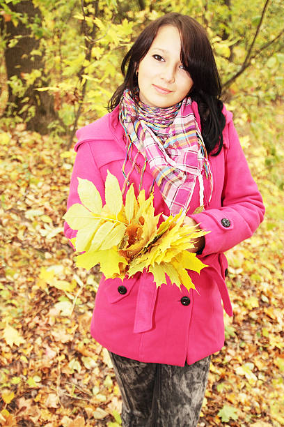 istock Girl with leaves 119475621