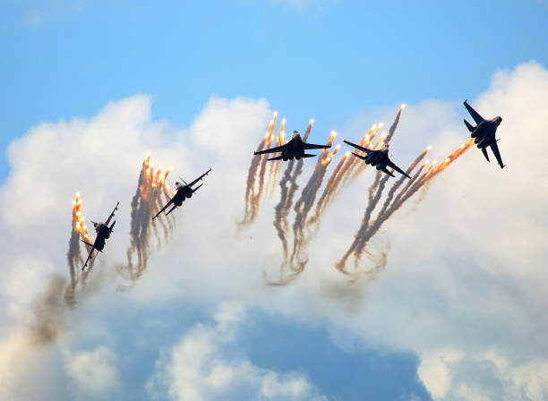 istock Fighters group anti missile maneuver 1194756848